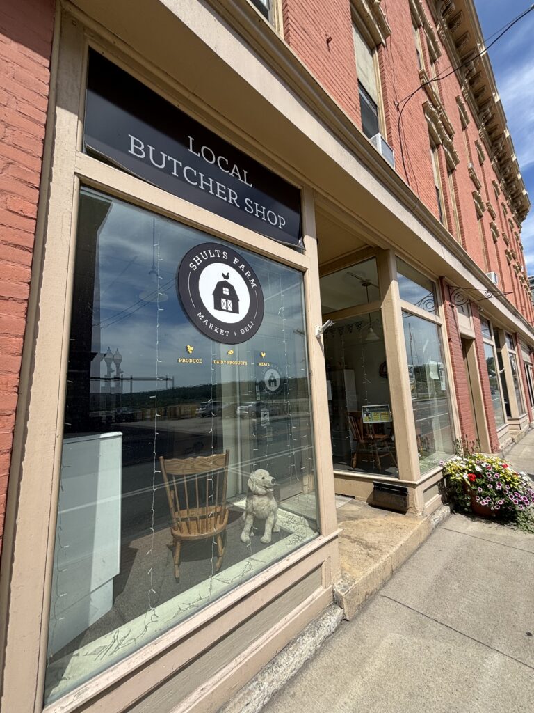 Photo of a storefront on a main street.