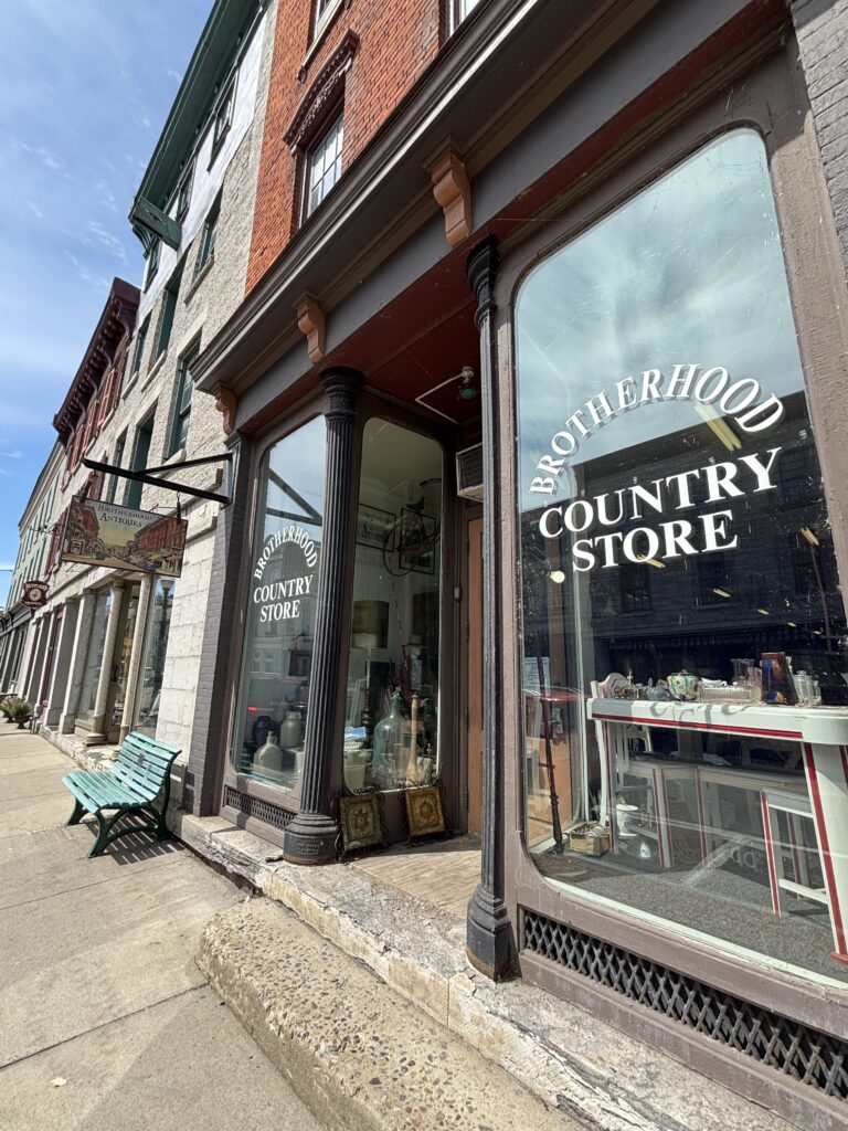 Photo of a storefront on a main street.
